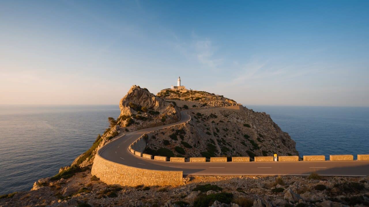 Original Mallorca — Formentor Formentor lighthouse and winding coastal road in northern Mallorca
